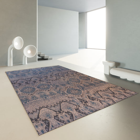 Blue beige patterned area rug in modern room